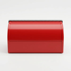 Side view of red bread box on wooden counter in store
