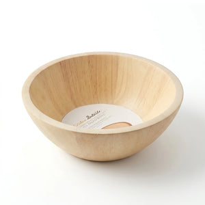 Enhanced Small wooden salad bowl with smooth light wood finish on a countertop