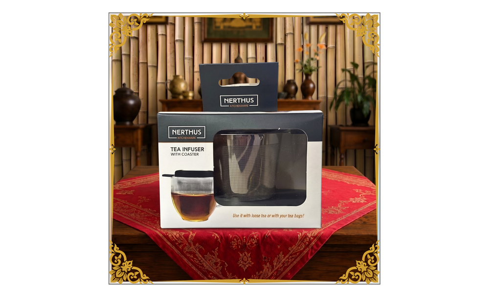 Front of Nerthus Tea Infuser with Coaster packaging on a decorated table